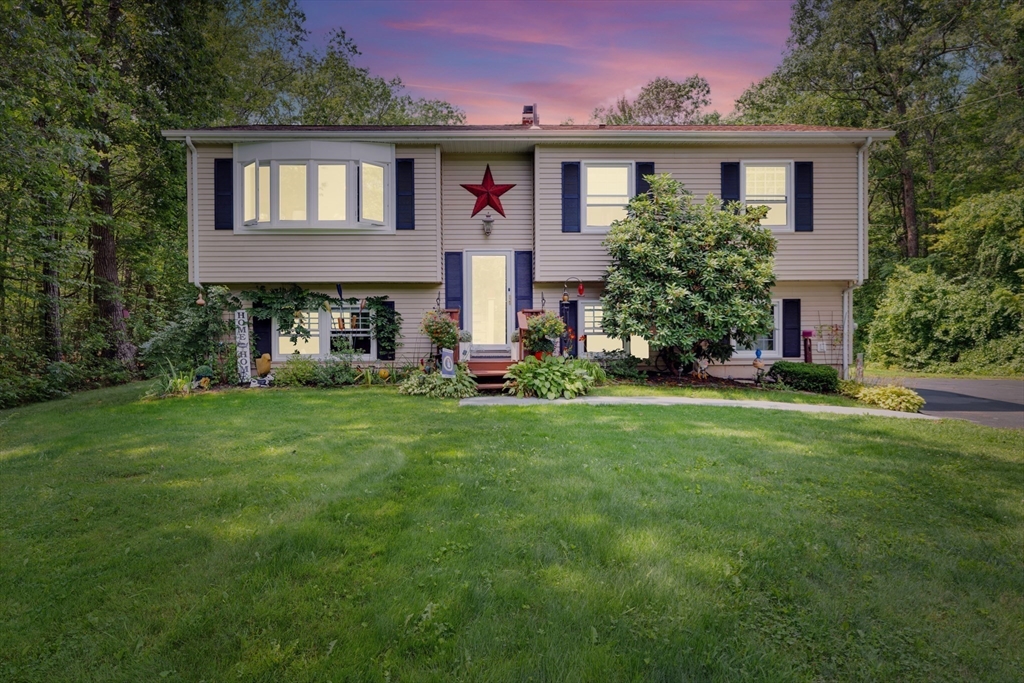 150 Osborne Road Ware, MA 01082 - Photo 38 of 38 a front view of a house with a yard and trees