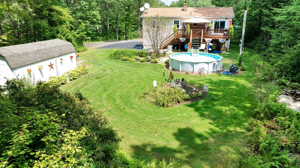 150 Osborne Road Ware, MA 01082 - Photo 5 of 38 a front view of a house with garden