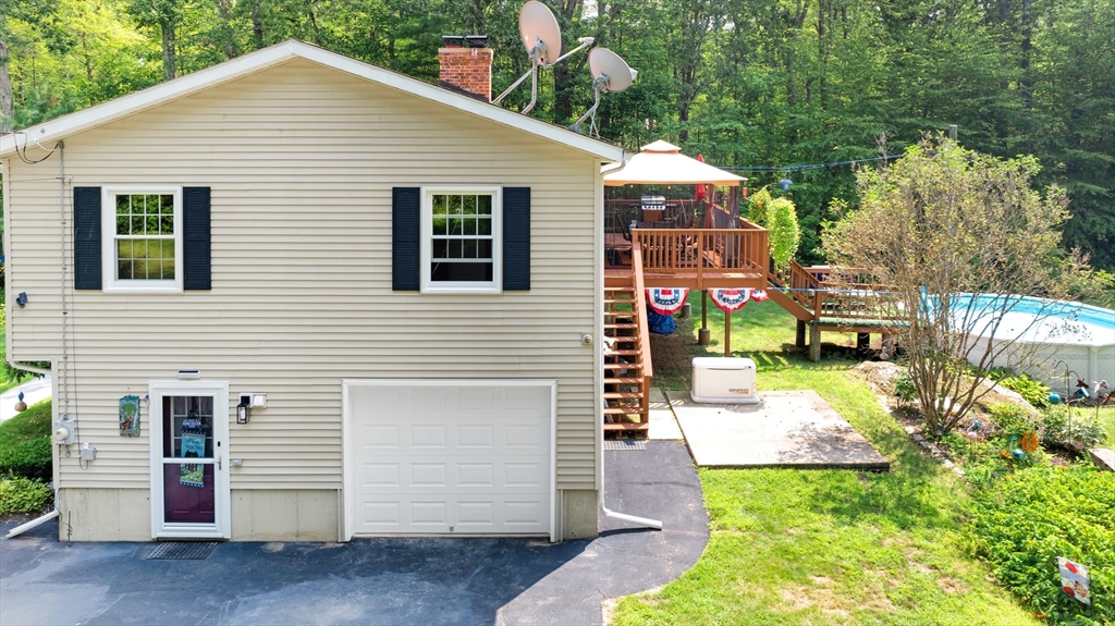 150 Osborne Road Ware, MA 01082 - Photo 6 of 38 a view of a house with a yard