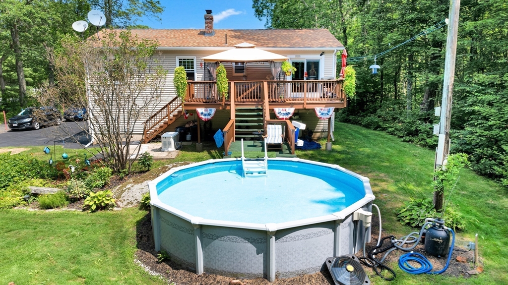 150 Osborne Road Ware, MA 01082 - Photo 8 of 38 a view of a house with pool and chairs