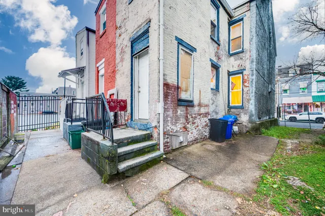a view of street with sitting area
