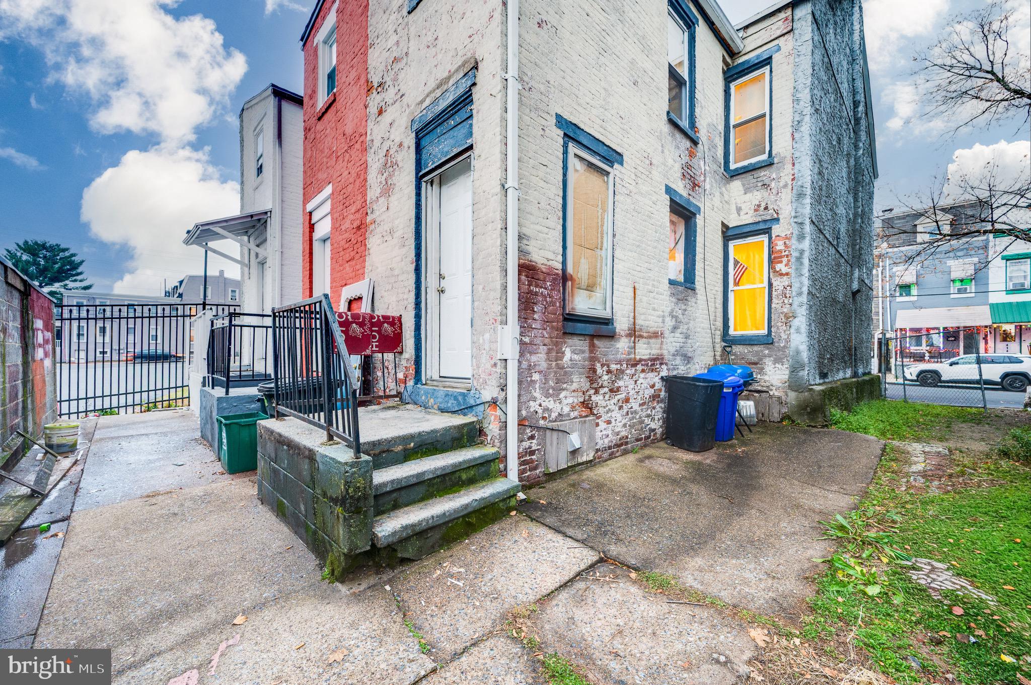 a view of street with sitting area