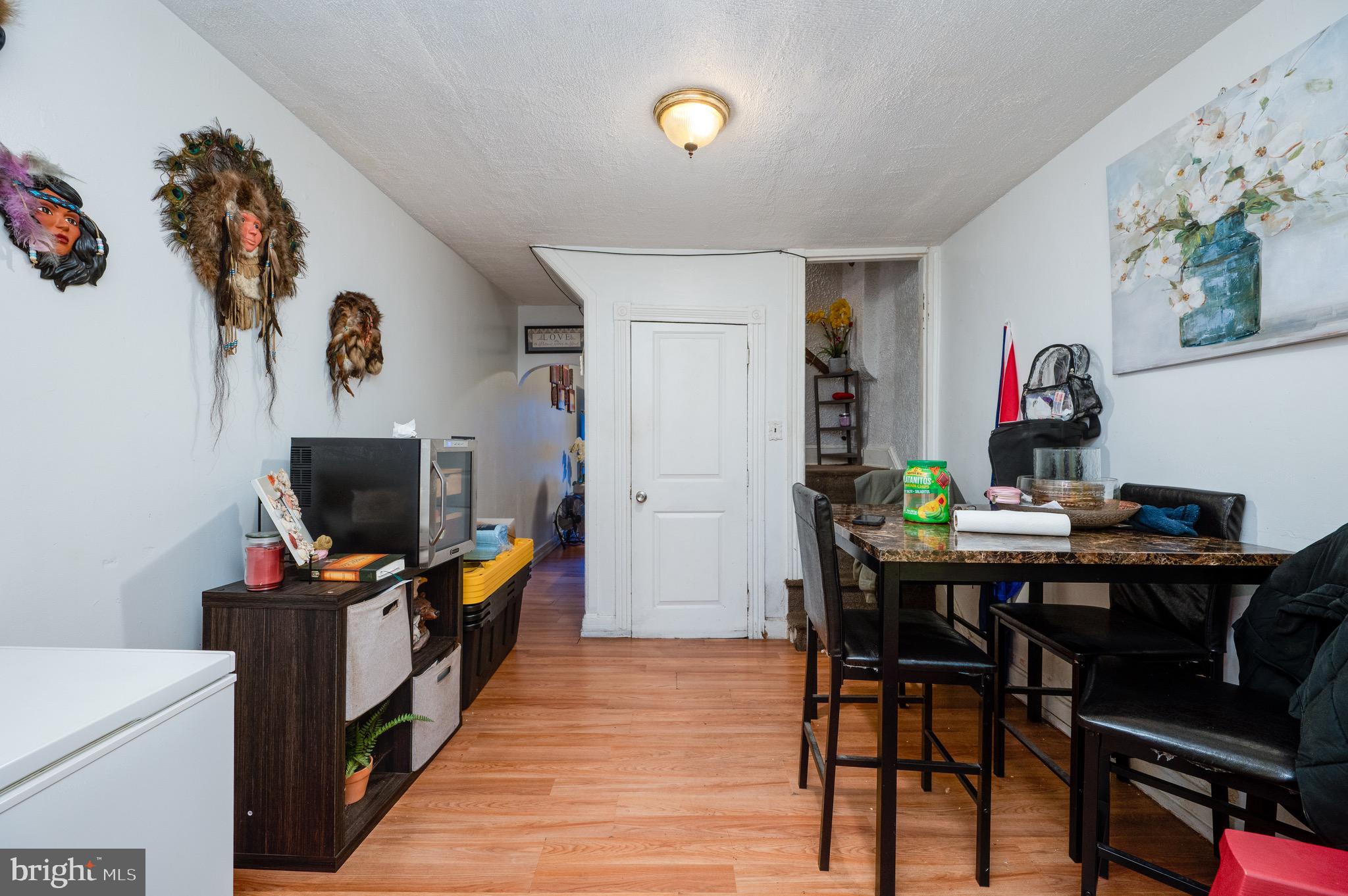 419 North 2nd Street Reading, PA 19601 - Photo 15 of 34 a living room with furniture and a flat screen tv