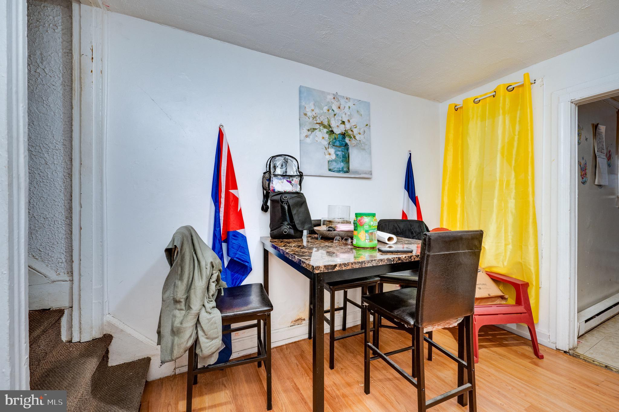 419 North 2nd Street Reading, PA 19601 - Photo 16 of 34 a view of a dining room with furniture and window