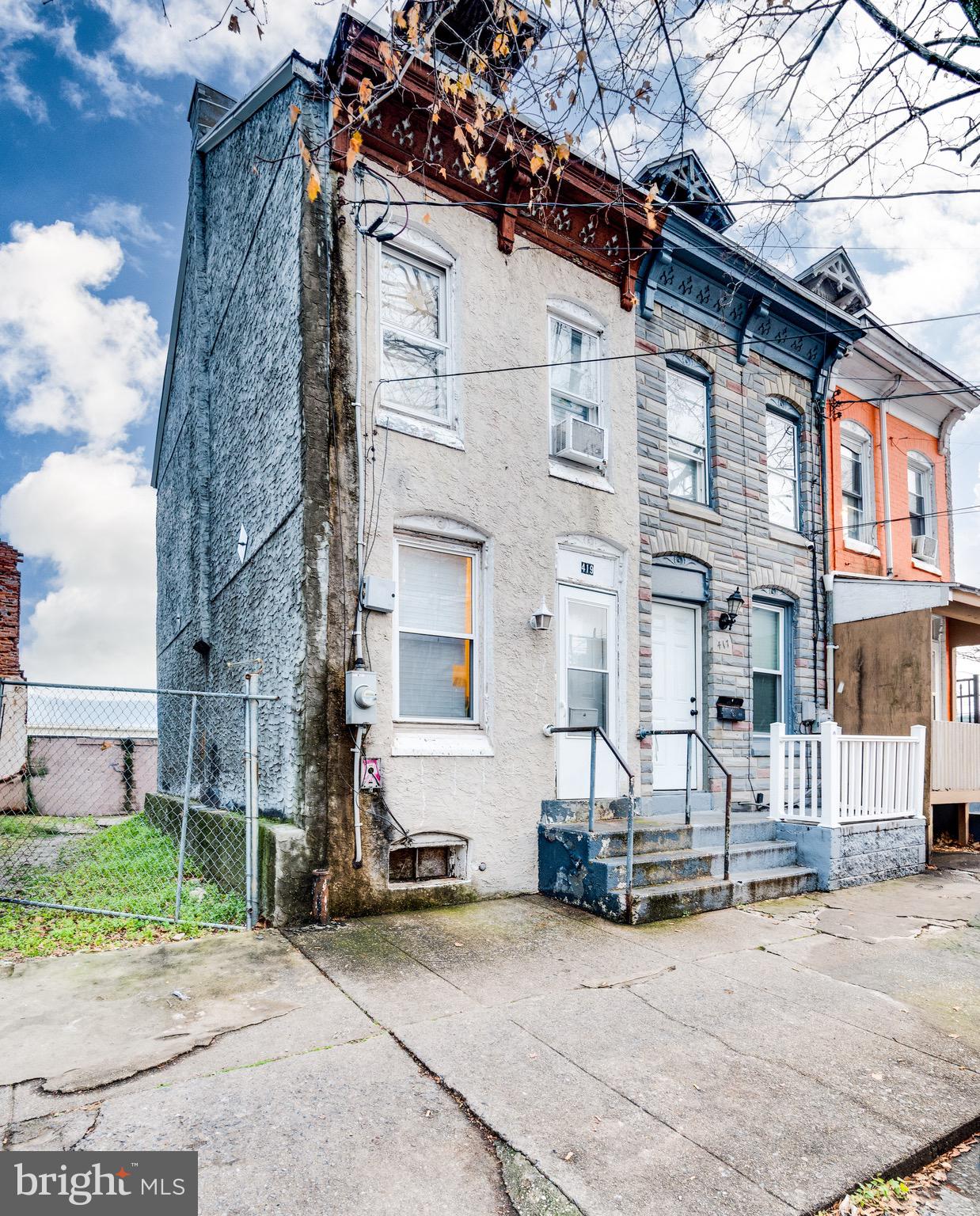 419 North 2nd Street Reading, PA 19601 - Photo 2 of 34 a view of a brick house with many windows