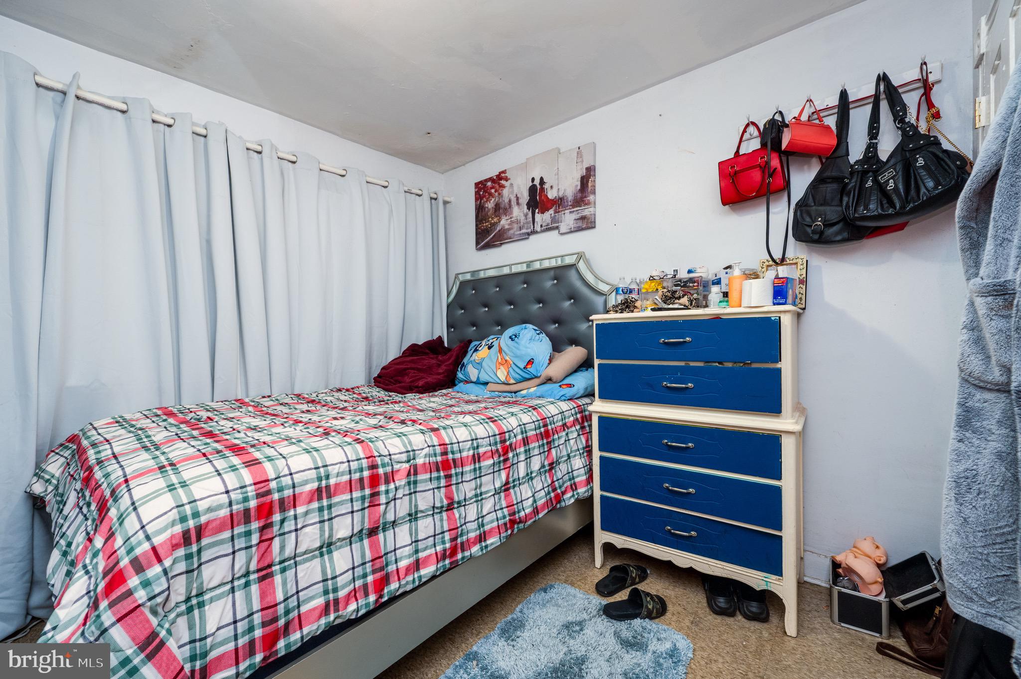 419 North 2nd Street Reading, PA 19601 - Photo 25 of 34 a bedroom with a bed and a window