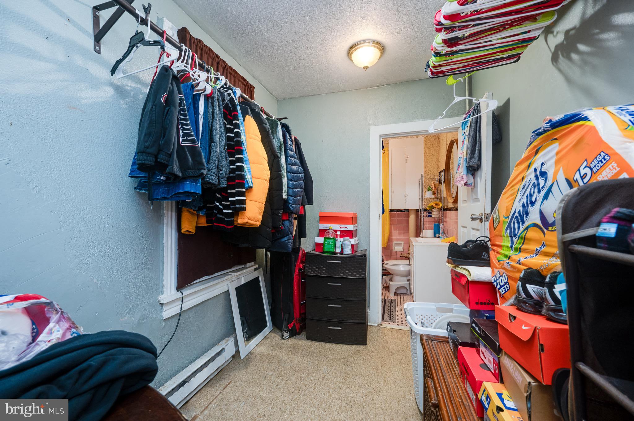 419 North 2nd Street Reading, PA 19601 - Photo 28 of 34 a view of walk in closet with clothes and shoes
