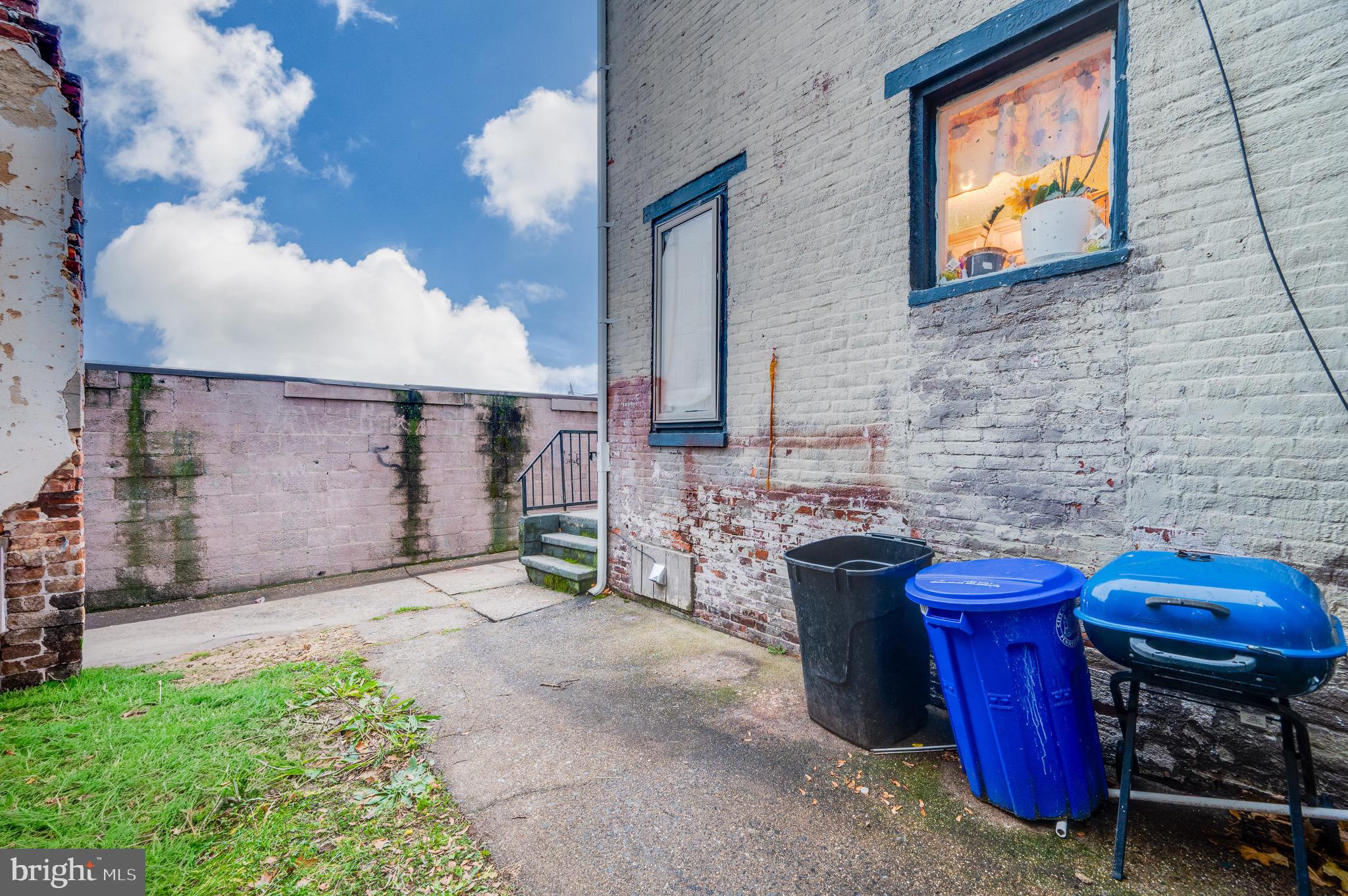 419 North 2nd Street Reading, PA 19601 - Photo 6 of 34 a view of a chairs and table in backyard