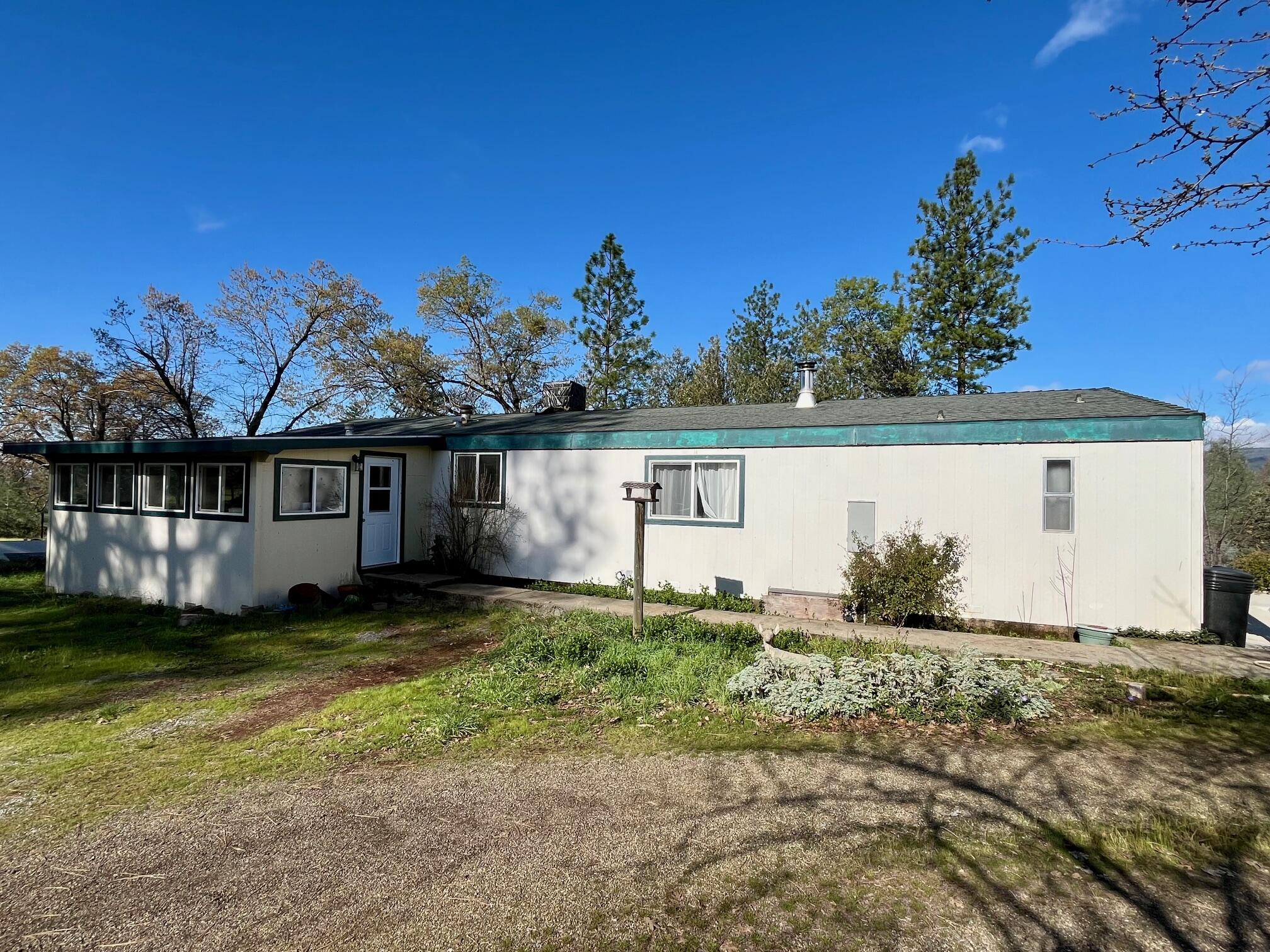 21875 Manton School Road Manton, CA 96059 - Photo 2 of 18 a view of a house with a yard