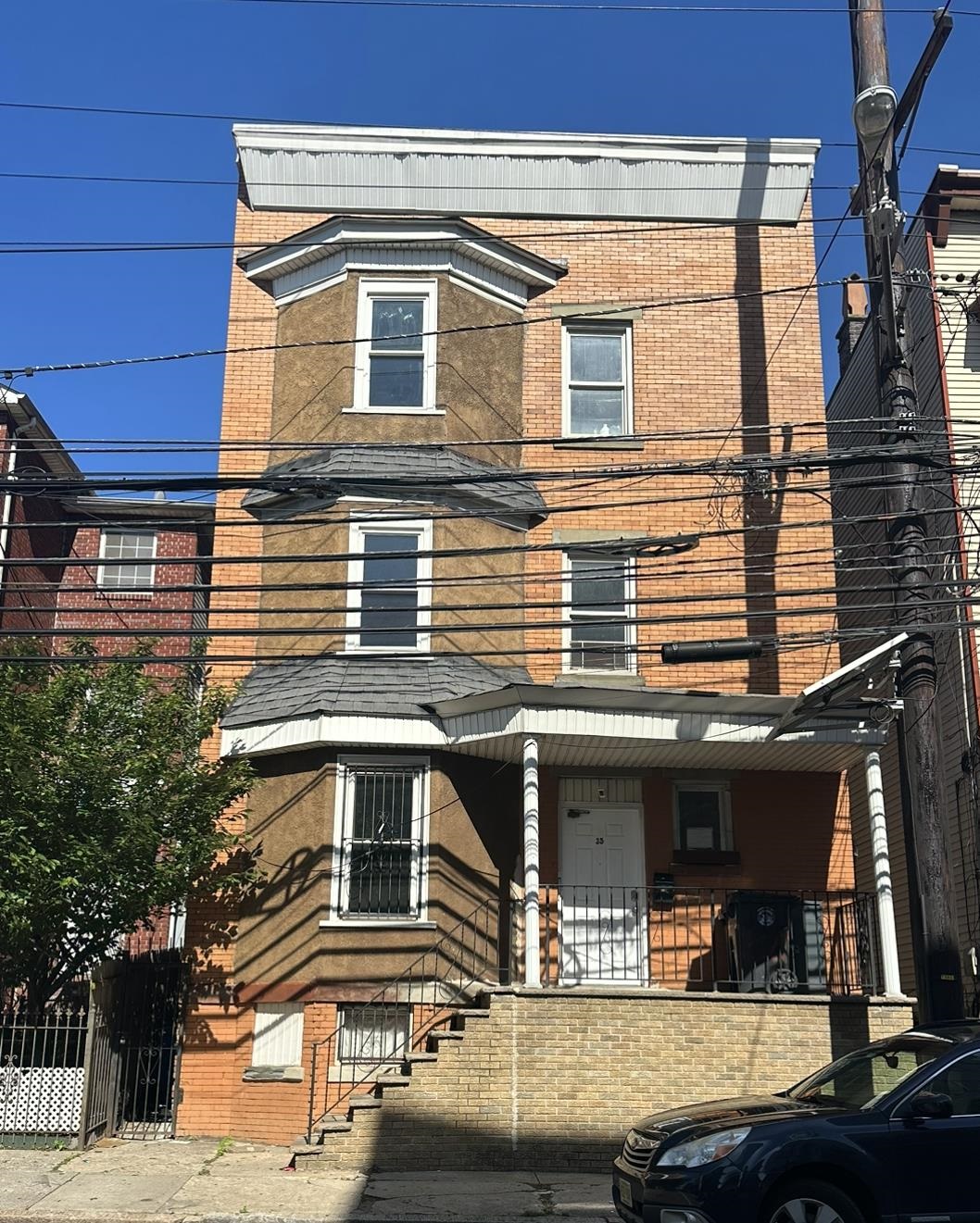35 Norfolk Street, Unit 3 Newark, NJ 07103 - Photo 1 of 24 a front view of a house with a balcony