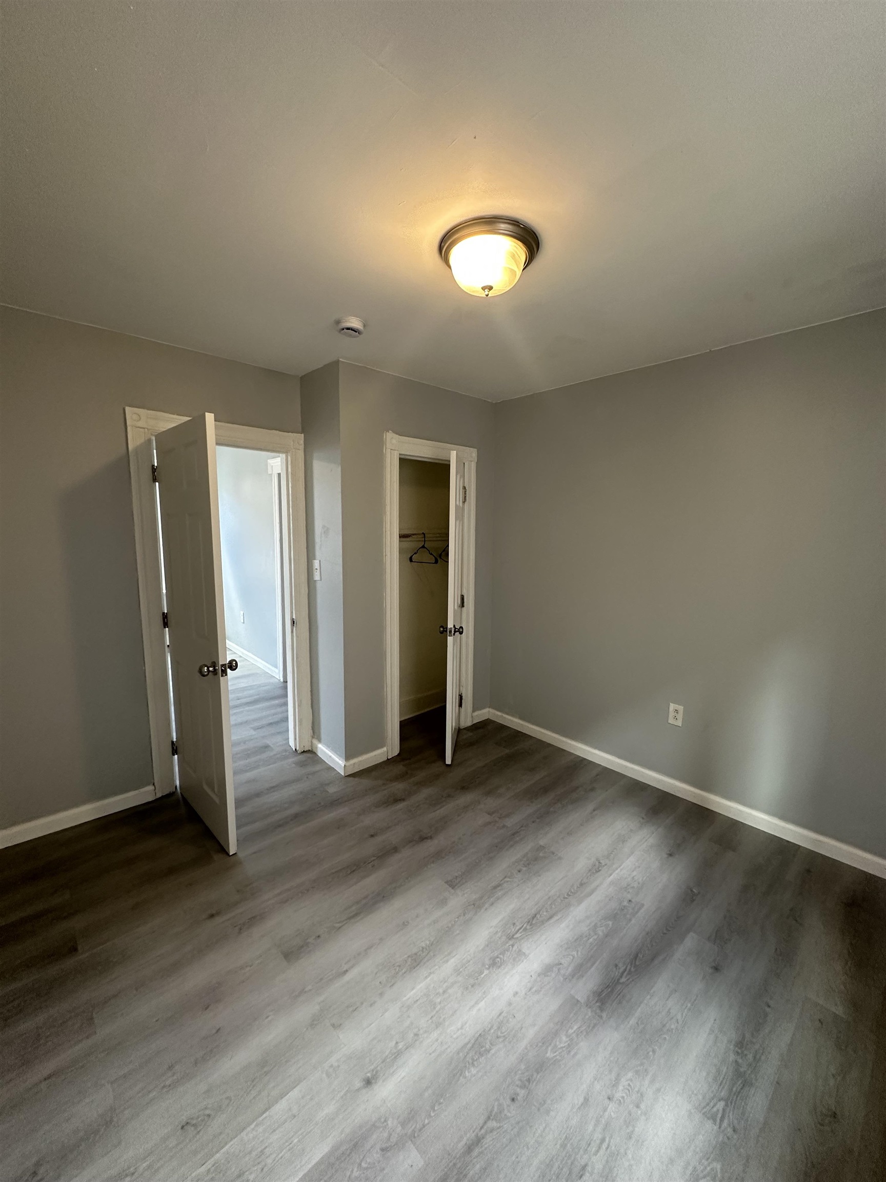 35 Norfolk Street, Unit 3 Newark, NJ 07103 - Photo 13 of 24 an empty room with wooden floor and entrance