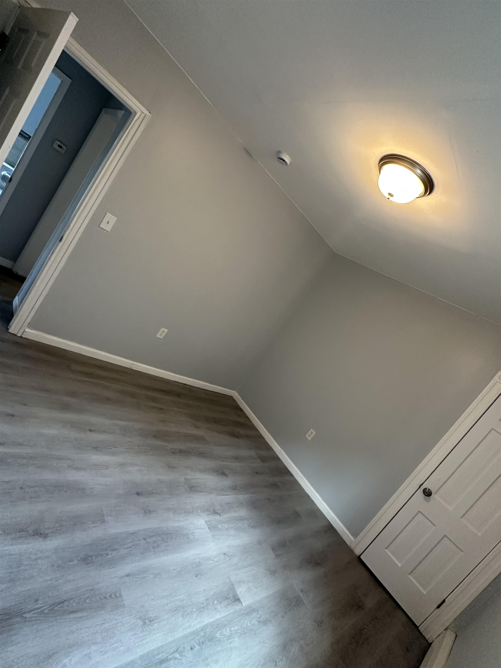 35 Norfolk Street, Unit 3 Newark, NJ 07103 - Photo 16 of 24 an empty room with wooden floor and windows