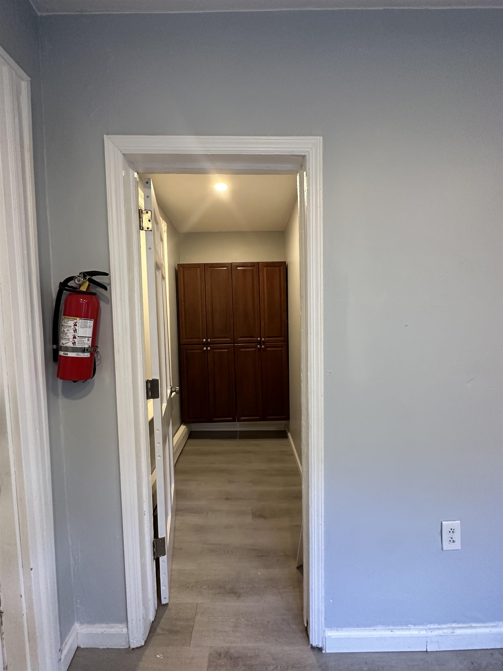35 Norfolk Street, Unit 3 Newark, NJ 07103 - Photo 23 of 24 a view of a hallway with wooden floor and a hallway