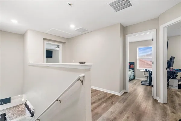 a view of livingroom with furniture and wooden floor