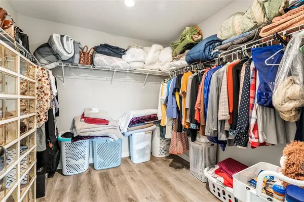 a bathroom with a bathtub and a toilet