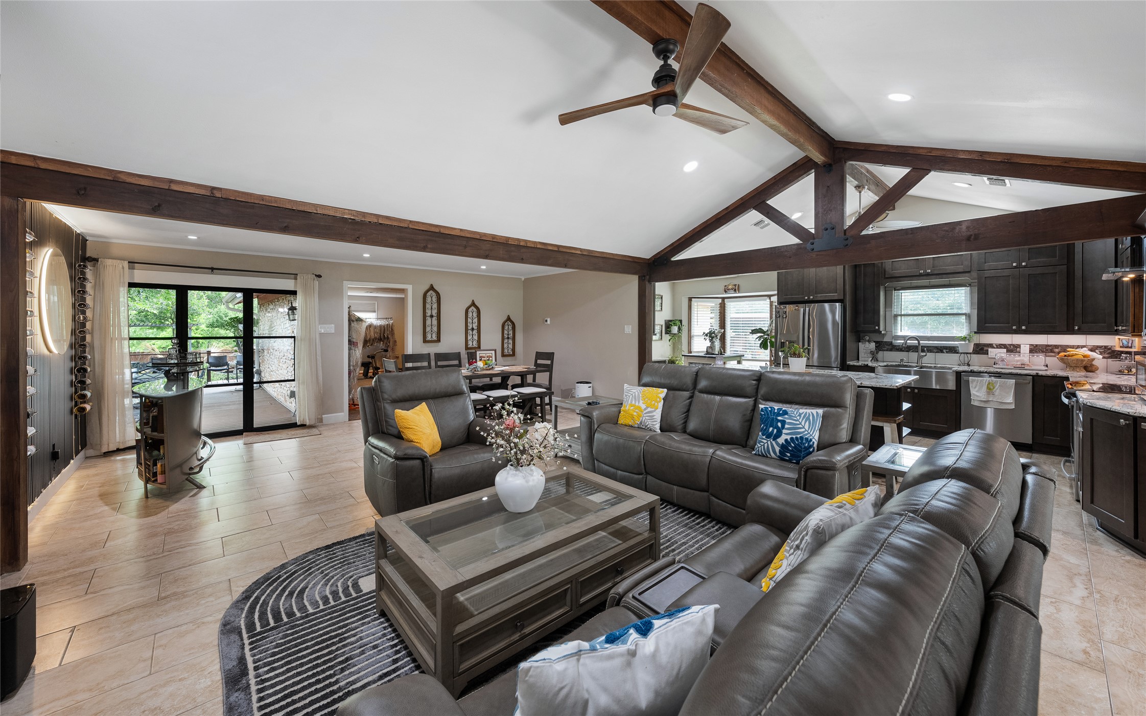 301 Oak Ridge Road Georgetown, TX 78628 - Photo 10 of 34 Spacious living area featuring a vaulted ceiling with exposed wood beams, wood-finish flooring, and recessed lighting