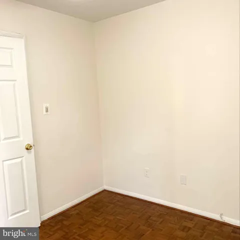 a view of a small space with wooden floor