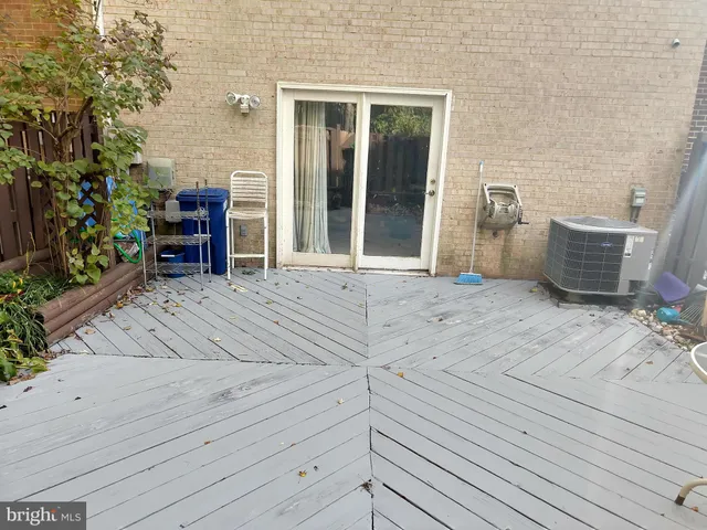 a view of a wooden floor with a bench