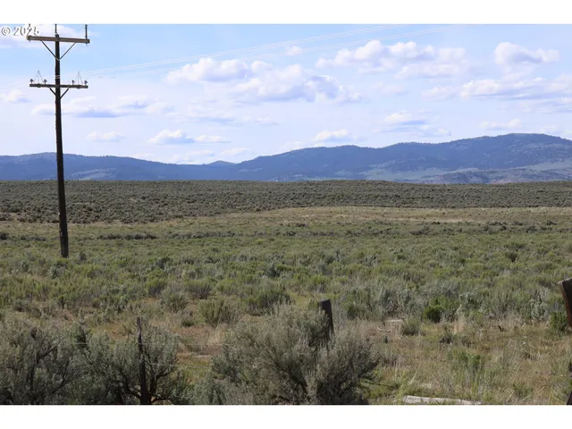 a view of a city with mountain
