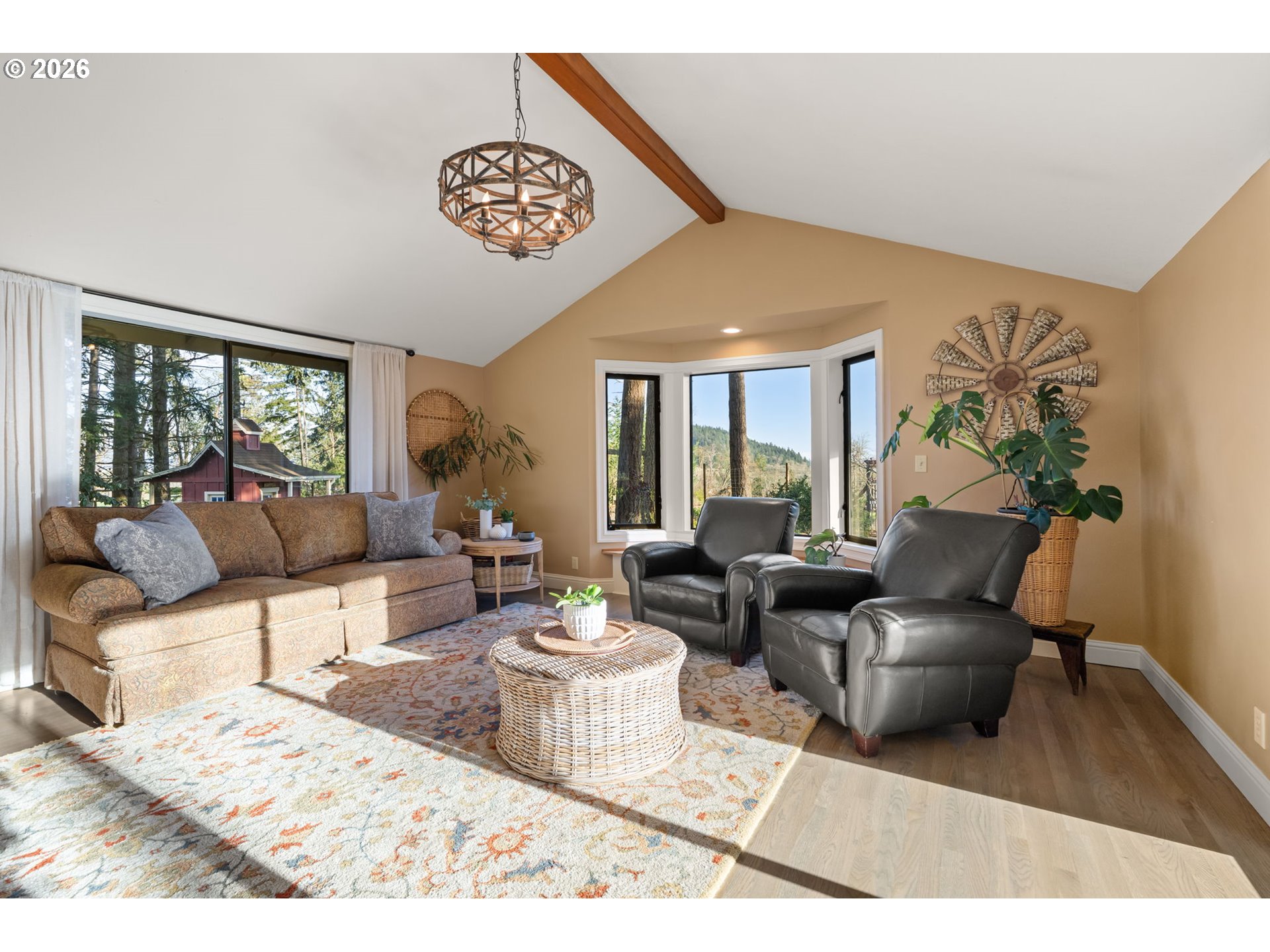 91448 Steinmetz Road Junction City, OR 97448 - Photo 19 of 48 a living room with furniture and a large window