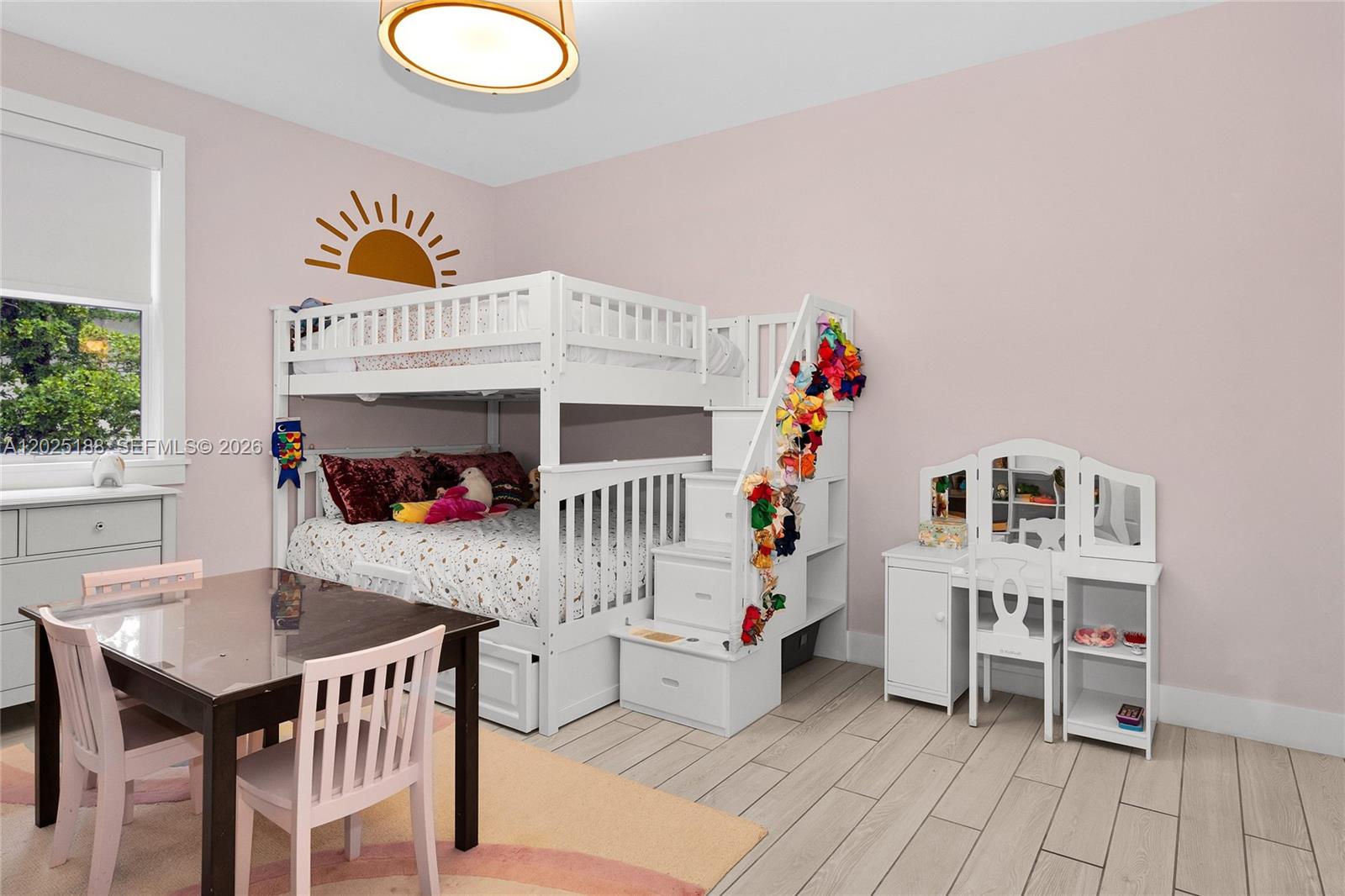 7620 Southwest 102nd Street, Unit 121 Pinecrest, FL 33156 - Photo 11 of 18 a room with furniture and baby crib