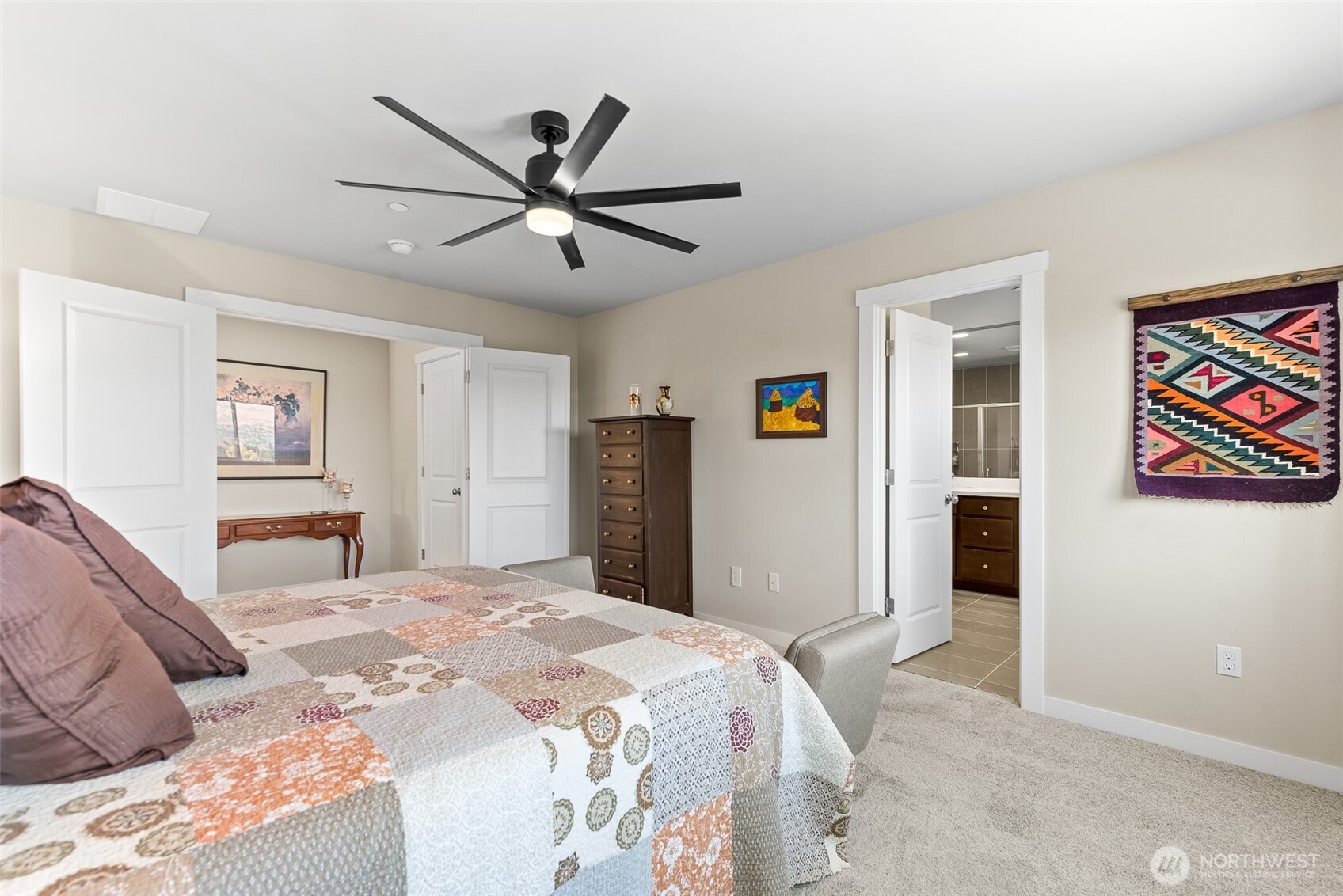 143 Sienna Road Wenatchee, WA 98801 - Photo 24 of 40 a bedroom with a large bed and a window