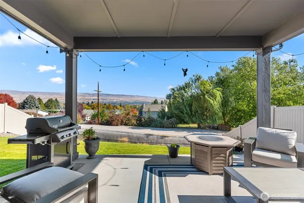a view of a swimming pool with a patio