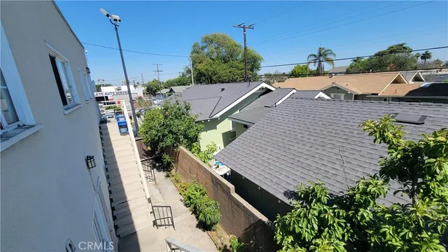 a bathroom with a shower and a sink