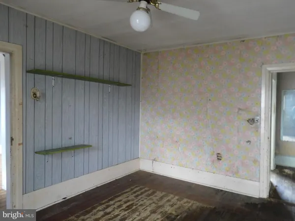 a view of kitchen and wooden floor