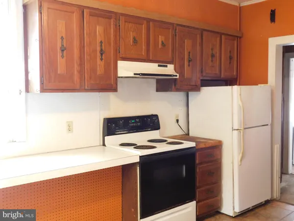 a bedroom with a bed and a cabinets