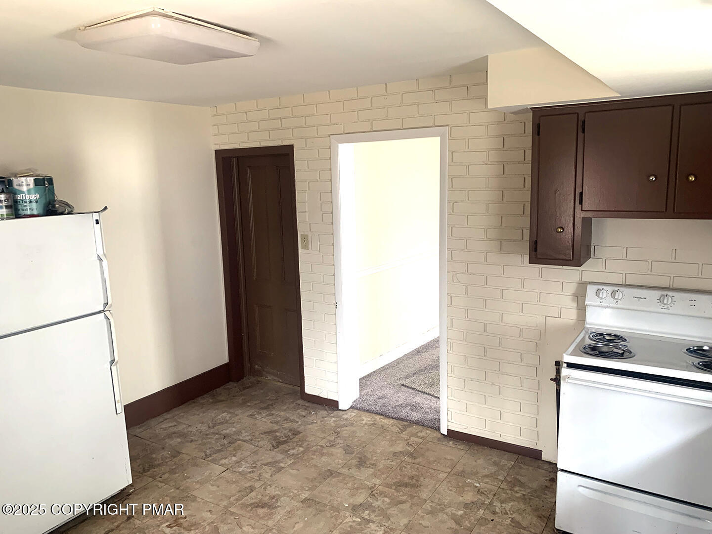 729 Ann Street Stroudsburg, PA 18360 - Photo 12 of 21 a kitchen with a refrigerator and a stove