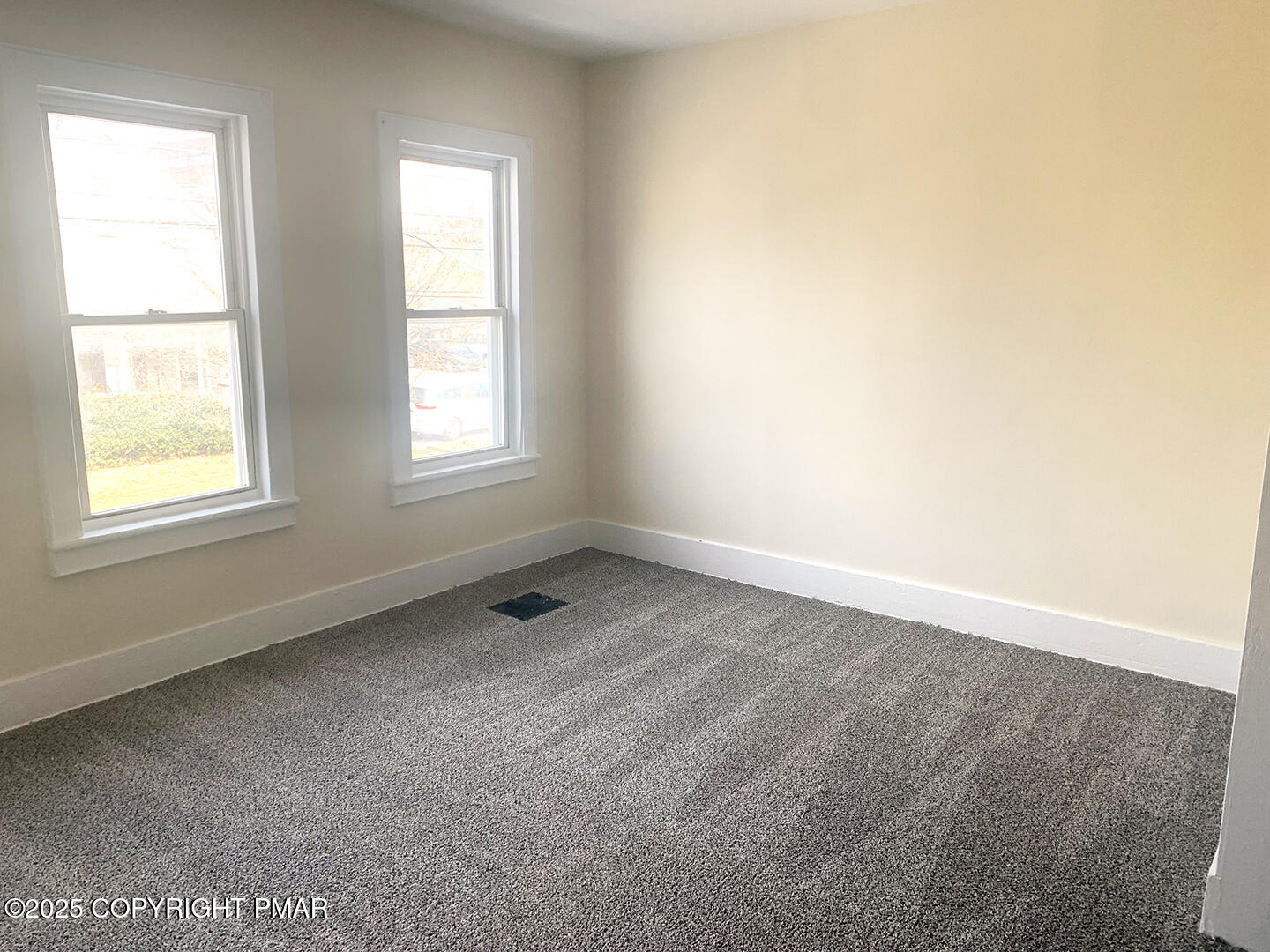729 Ann Street Stroudsburg, PA 18360 - Photo 18 of 21 an empty room with windows