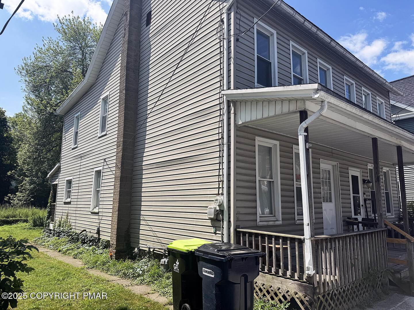 729 Ann Street Stroudsburg, PA 18360 - Photo 4 of 21 a view of a house with a window and wooden fence