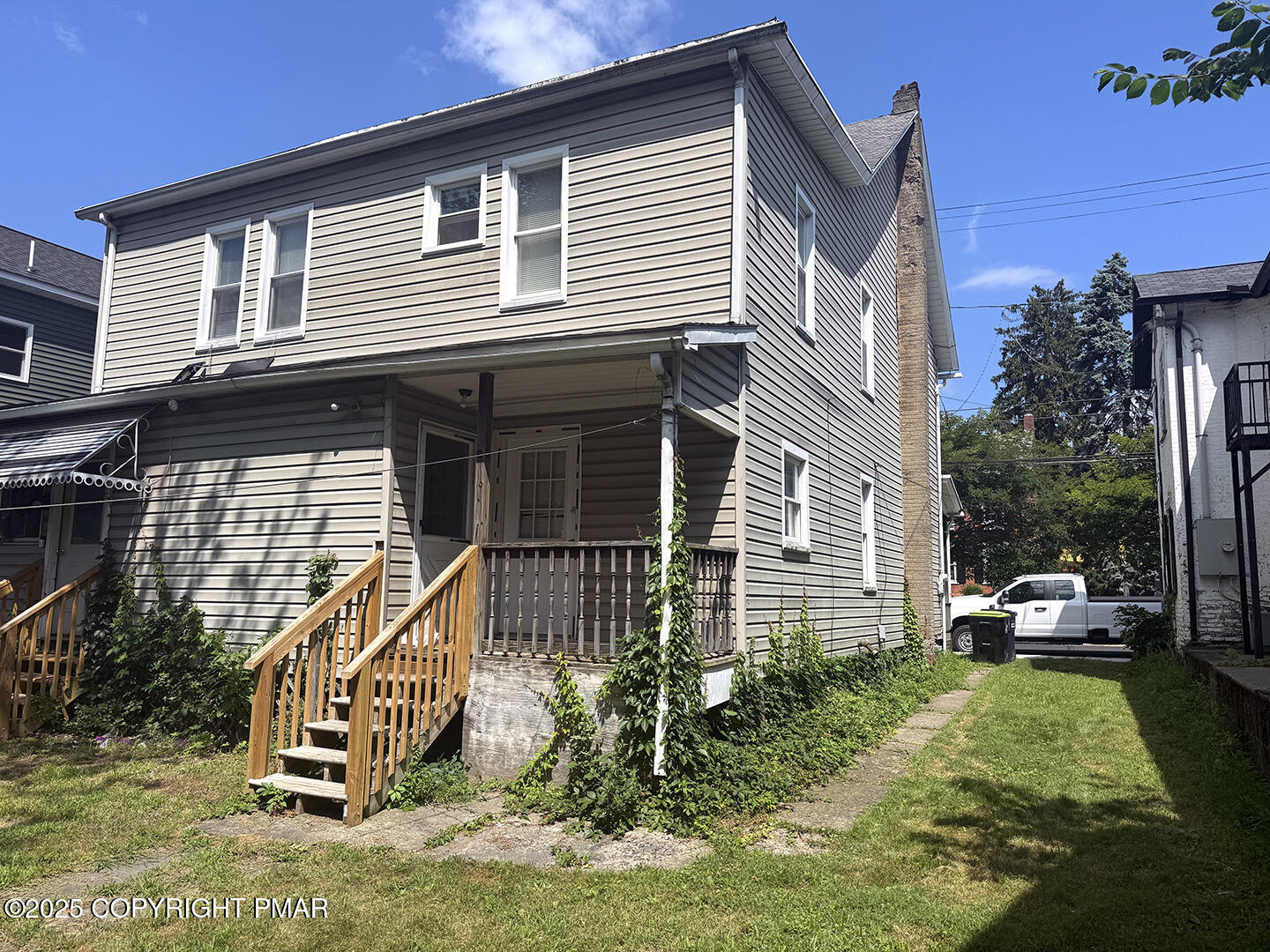 729 Ann Street Stroudsburg, PA 18360 - Photo 6 of 21 a view of a house with a yard and furniture