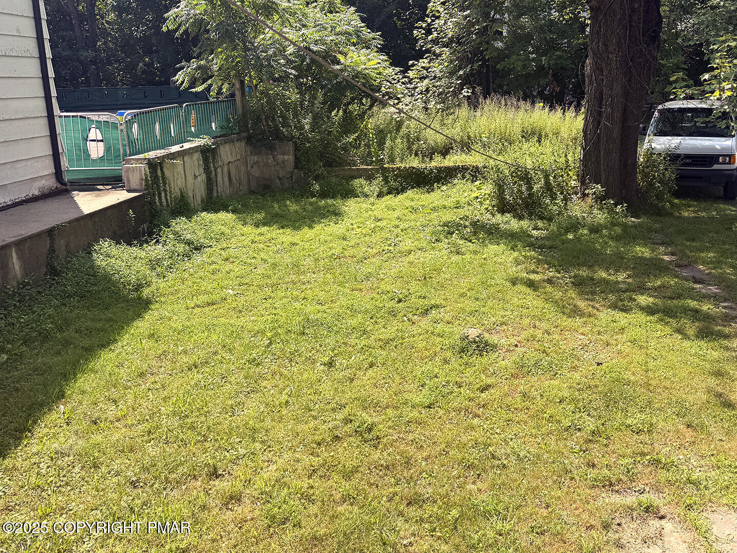 729 Ann Street Stroudsburg, PA 18360 - Photo 7 of 21 a backyard of a house with lots of green space