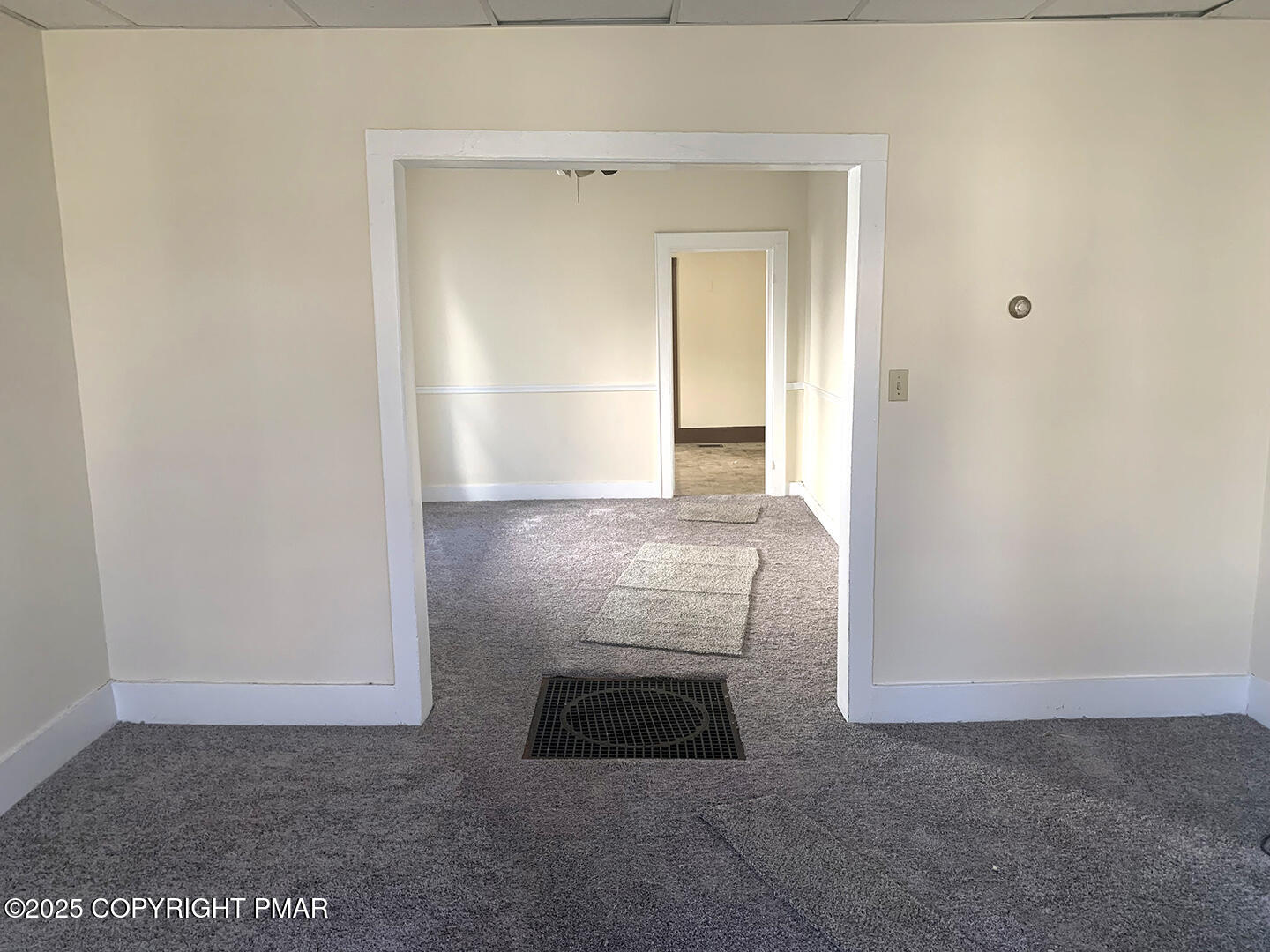 729 Ann Street Stroudsburg, PA 18360 - Photo 10 of 21 a view of a livingroom from a hallway