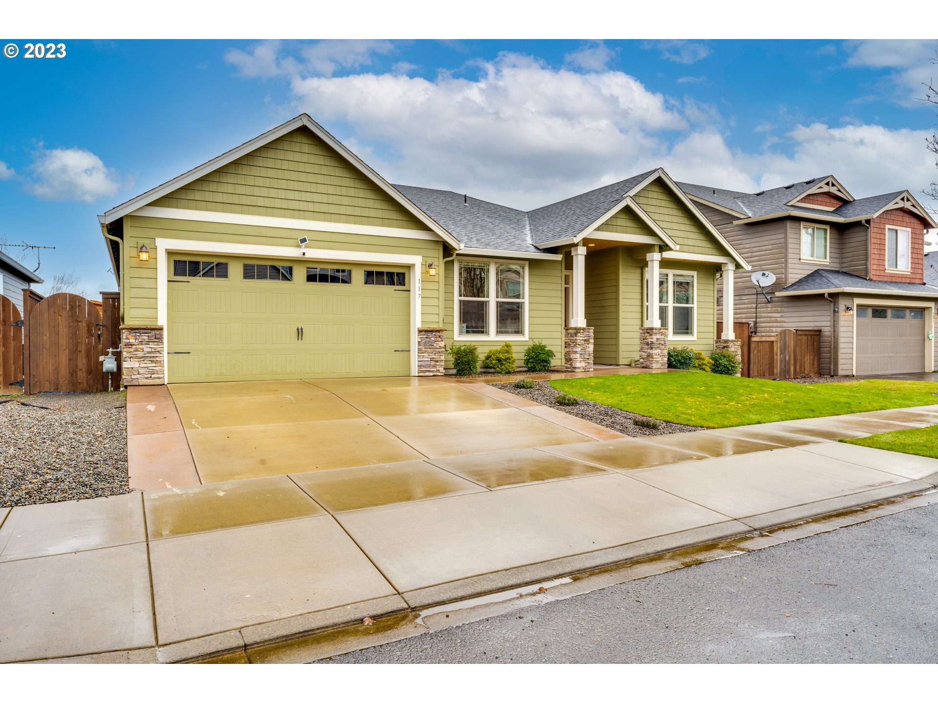 117 North 38th Place Ridgefield, WA 98642 - Photo 1 of 32 a front view of a house with a yard