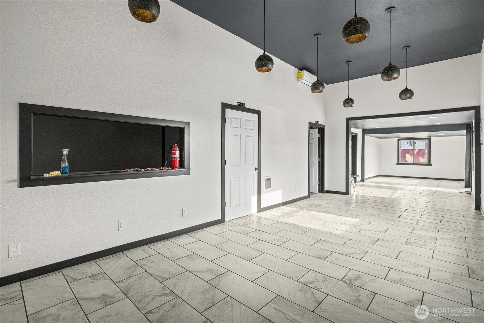 100 Main Street Kittitas, WA 98934 - Photo 2 of 7 a view of a livingroom with an empty space