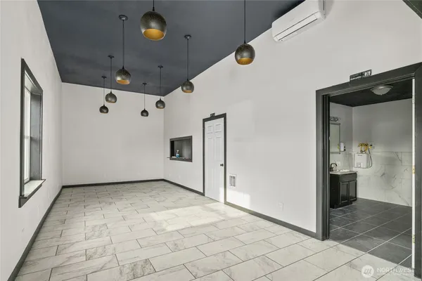 a view of a livingroom with a staircase