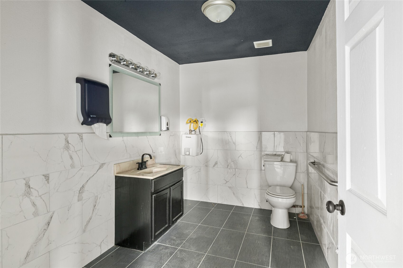 100 Main Street Kittitas, WA 98934 - Photo 6 of 7 a bathroom with a sink toilet and mirror
