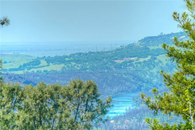 a bathroom with a bathtub and a window
