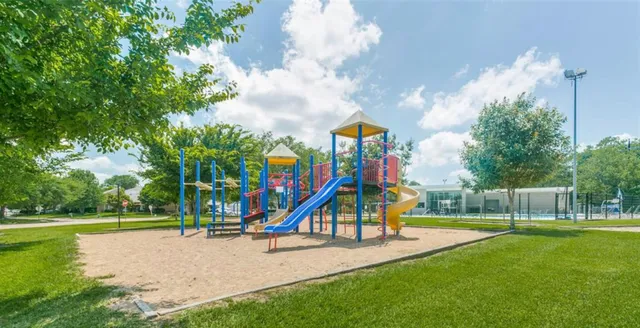 a view of park with swings