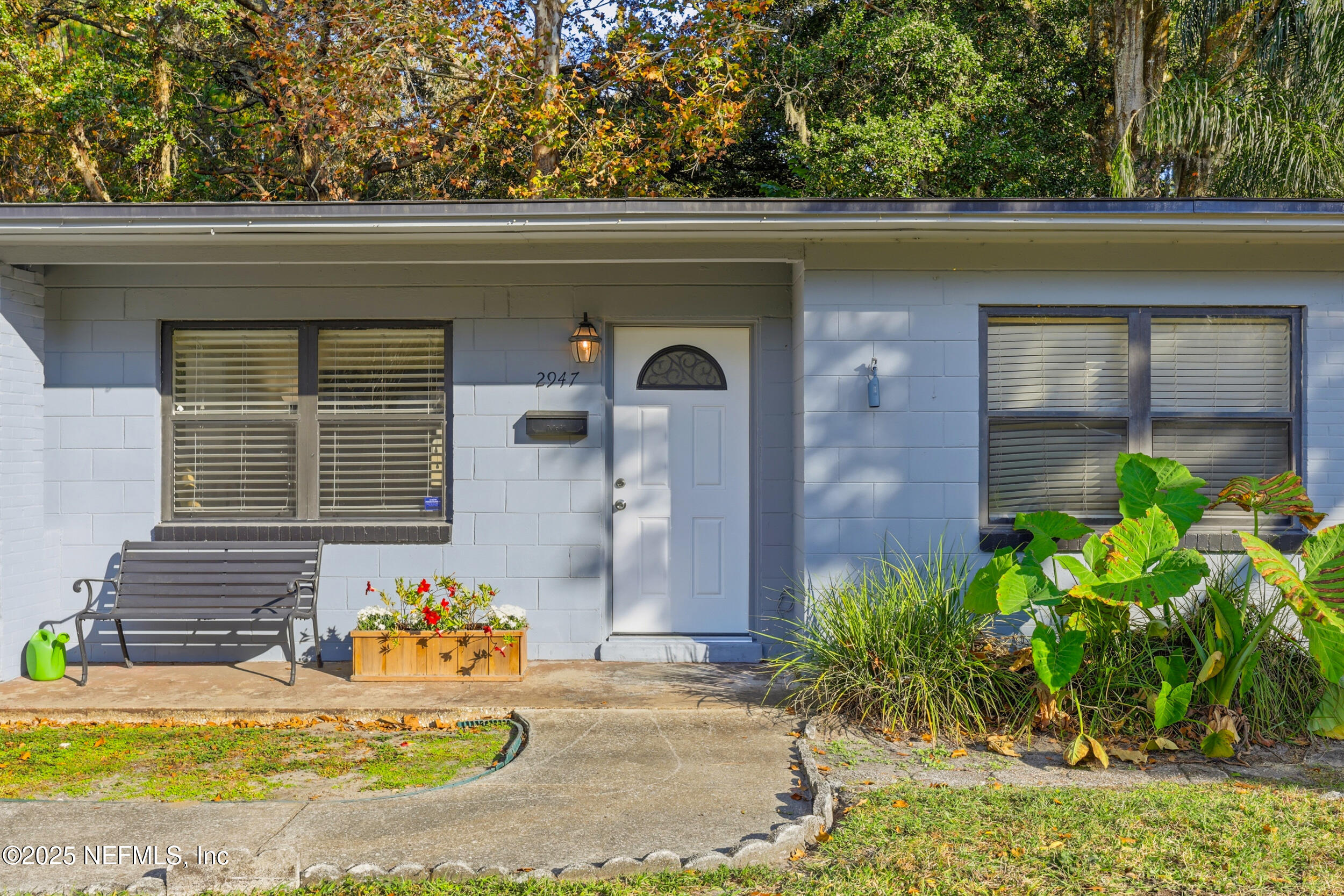 2947 Kline Road Jacksonville, FL 32246 - Photo 2 of 29 a front view of a house with garden