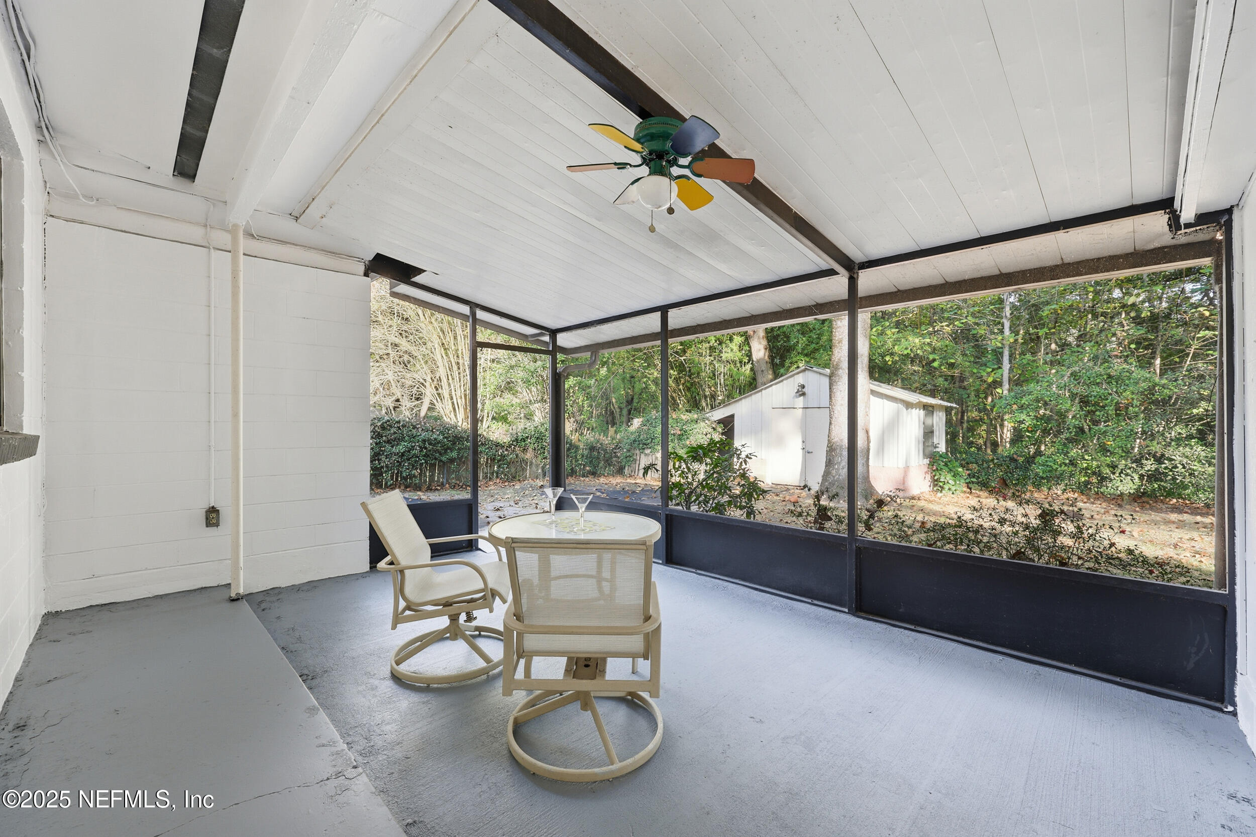 2947 Kline Road Jacksonville, FL 32246 - Photo 22 of 29 a living room with furniture and a large window
