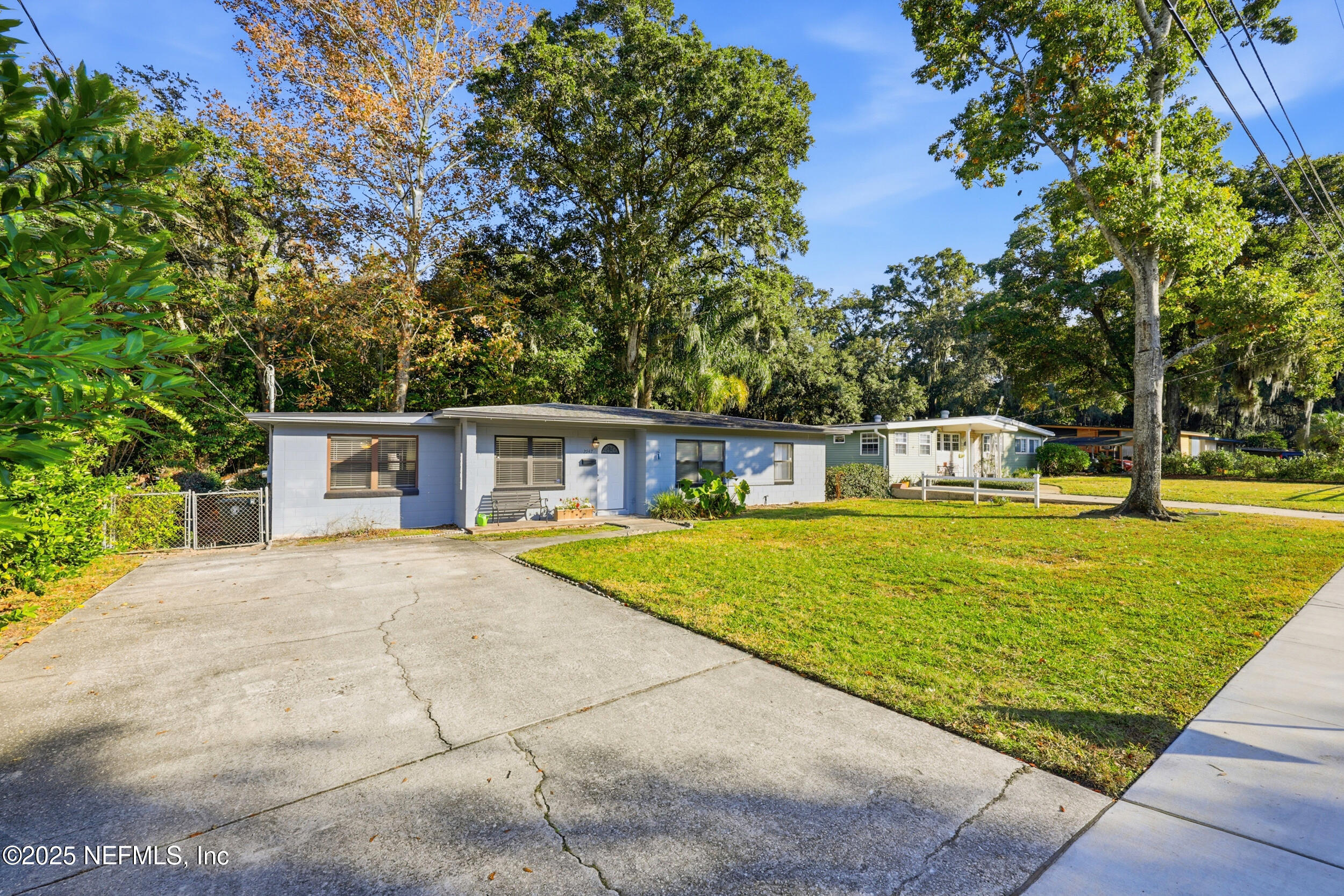 2947 Kline Road Jacksonville, FL 32246 - Photo 25 of 29 a front view of a house with a yard