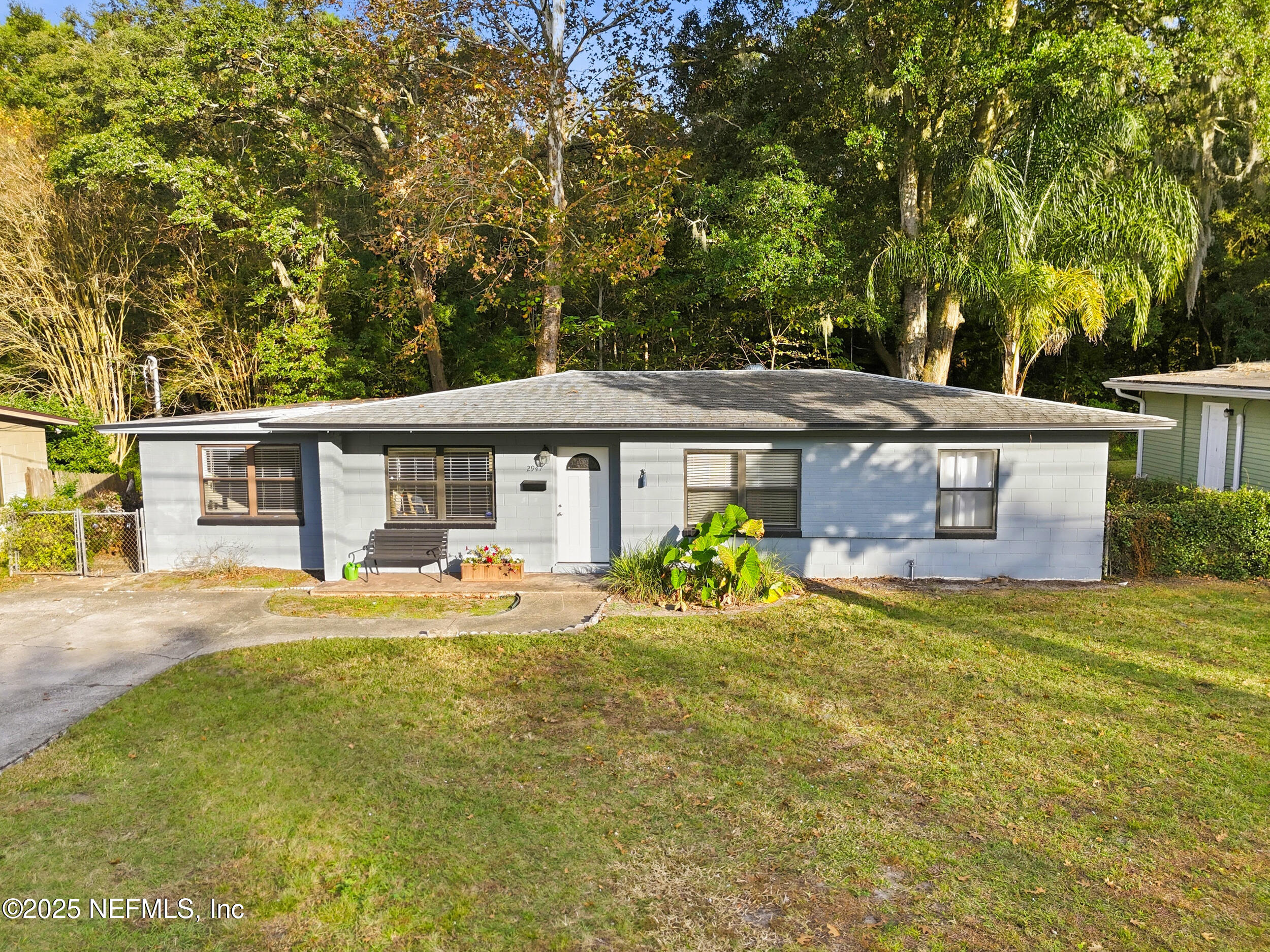 2947 Kline Road Jacksonville, FL 32246 - Photo 28 of 29 a view of a house with swimming pool and sitting area