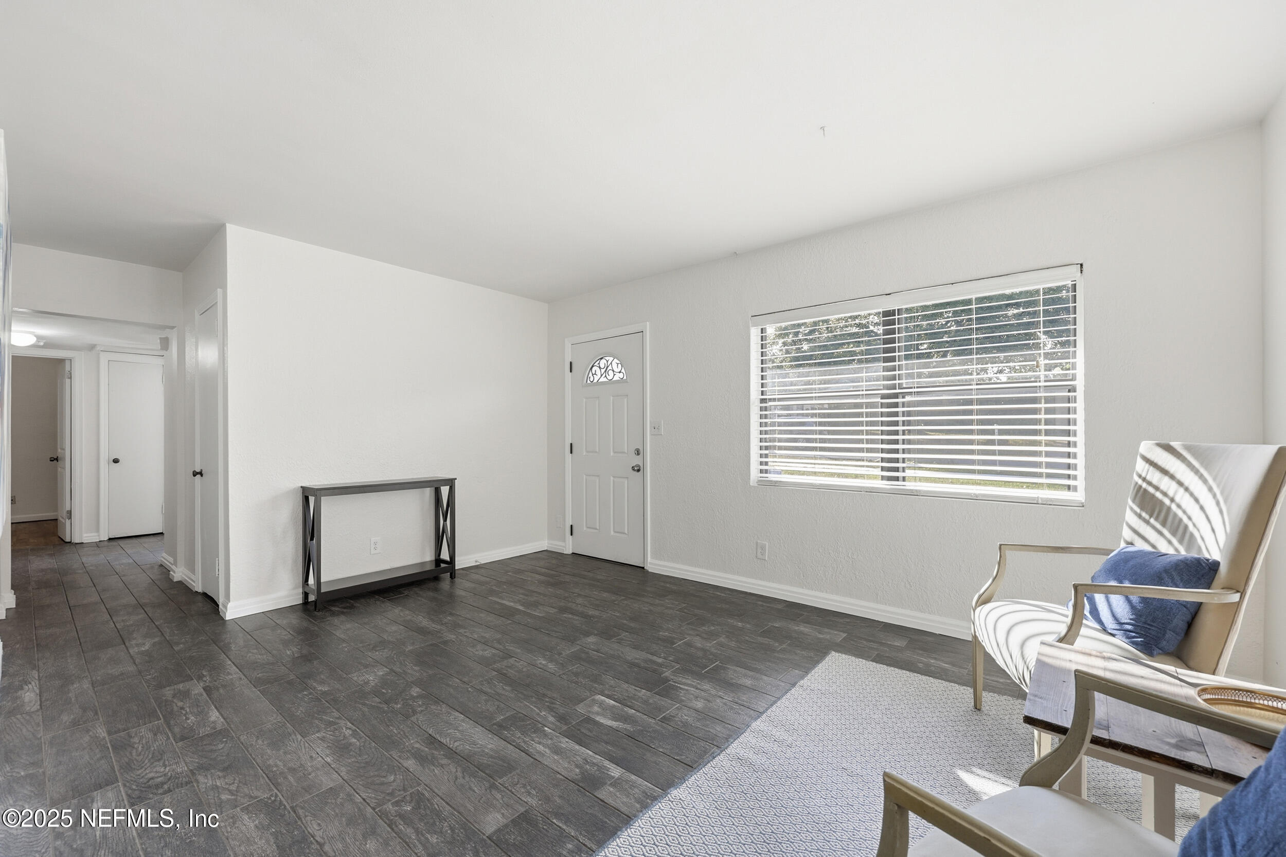 2947 Kline Road Jacksonville, FL 32246 - Photo 4 of 29 a view of an empty room with a window