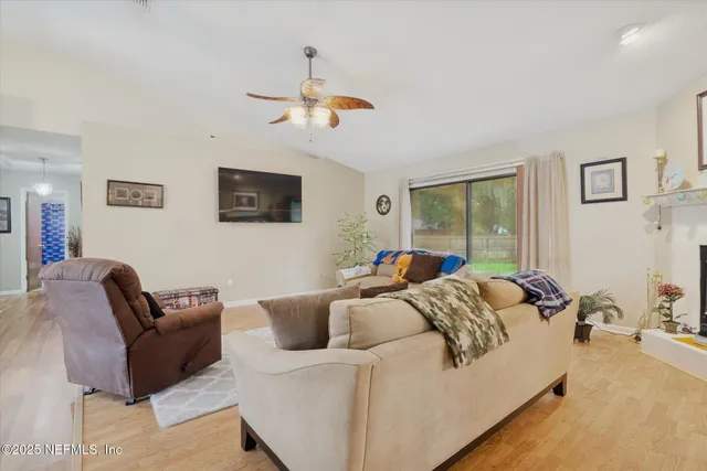 a bedroom with furniture and windows