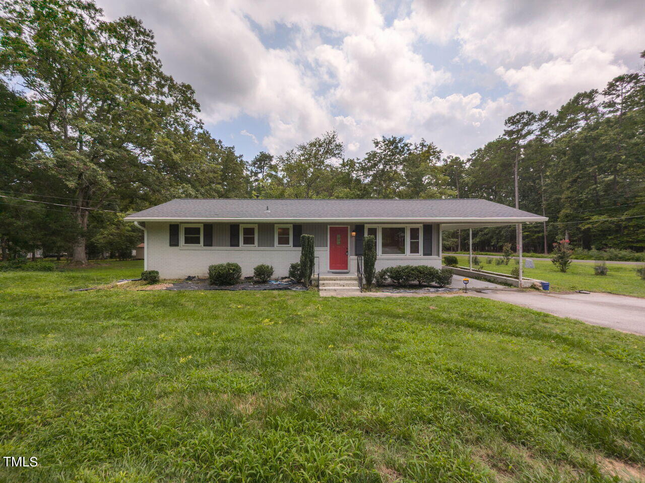 809 Lakeview Road Durham, NC 27712 - Photo 1 of 49 a front view of house with yard seating and green space