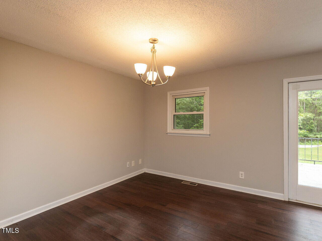 809 Lakeview Road Durham, NC 27712 - Photo 8 of 49 wooden floor in an empty room with a window